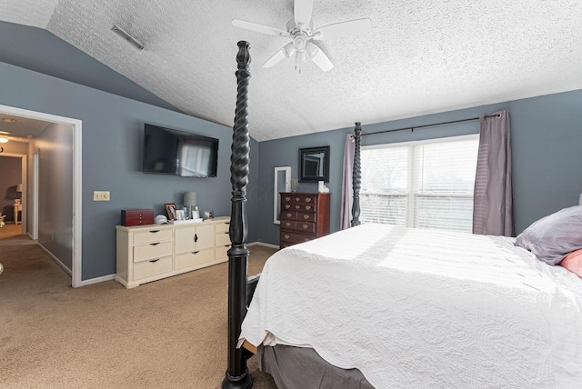 bedroom with light carpet, a textured ceiling, vaulted ceiling, visible vents, and baseboards