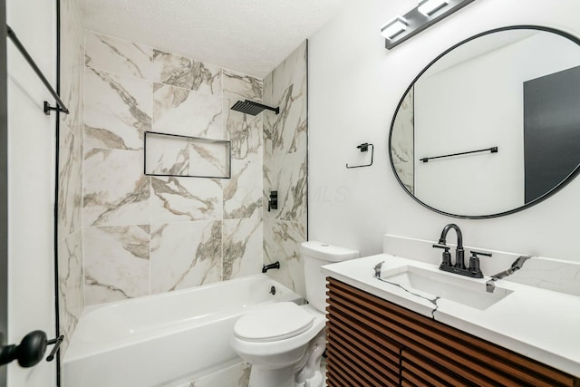 bathroom featuring shower / washtub combination, a textured ceiling, vanity, and toilet