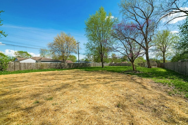 view of yard with fence