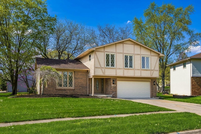 view of front of house featuring a front yard, a garage, brick siding, concrete driveway, and stucco siding