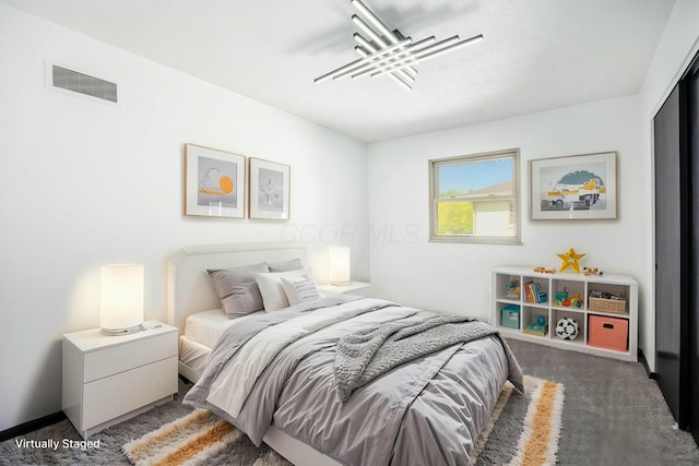 bedroom featuring visible vents and carpet floors