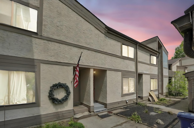 3236 Donalda Ct, Columbus, OH 43231 - back of house at dusk with stucco siding
