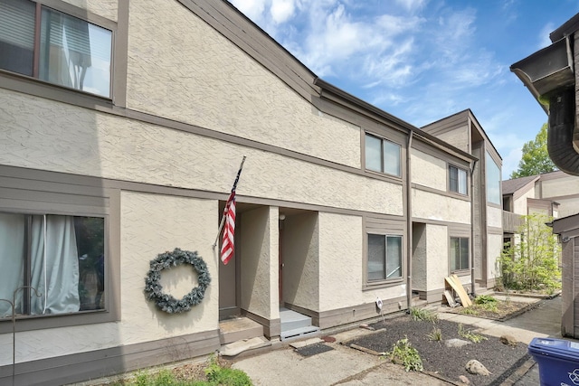 3236 Donalda Ct, Columbus, OH 43231 - view of property exterior featuring stucco siding