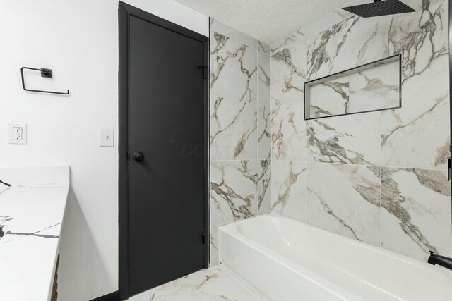 bathroom featuring shower / tub combination and a textured ceiling