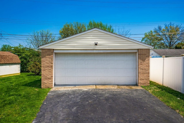 detached garage with fence