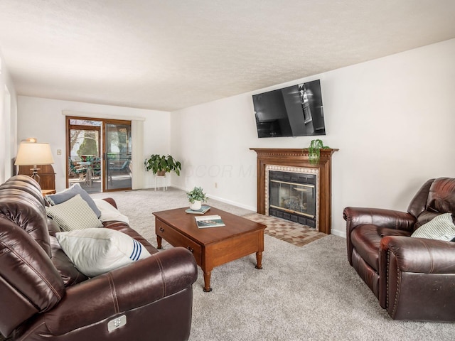 carpeted living room with a fireplace with flush hearth and baseboards