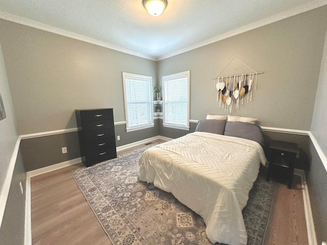 33 Hampden Dr, Granville, OH 43023 - bedroom featuring ornamental molding, wood finished floors, and baseboards