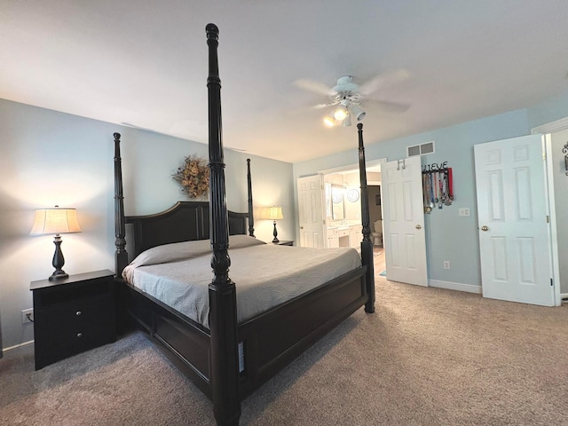 33 Hampden Dr, Granville, OH 43023 - carpeted bedroom featuring ensuite bath, baseboards, and ceiling fan