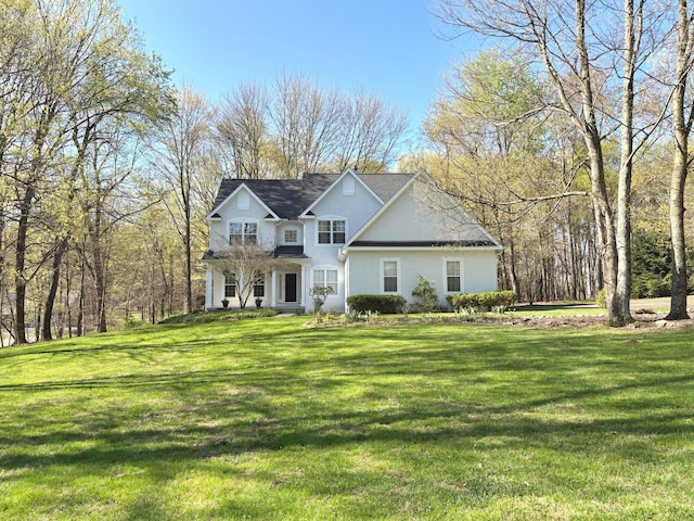 33 Hampden Dr, Granville, OH 43023 - traditional-style house featuring stucco siding and a front lawn