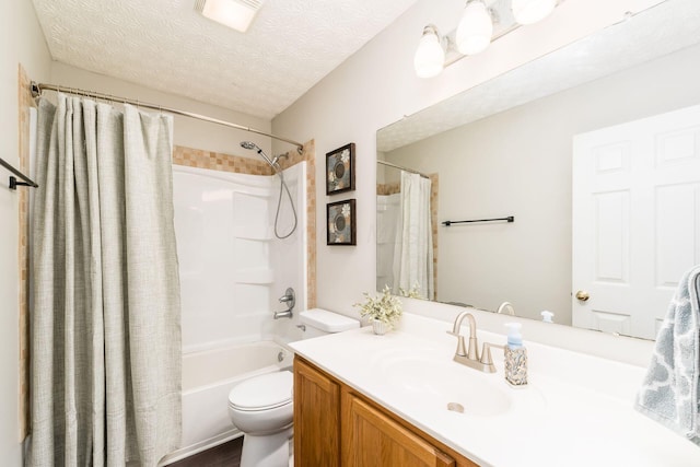 bathroom with shower / tub combo with curtain, a textured ceiling, toilet, and vanity