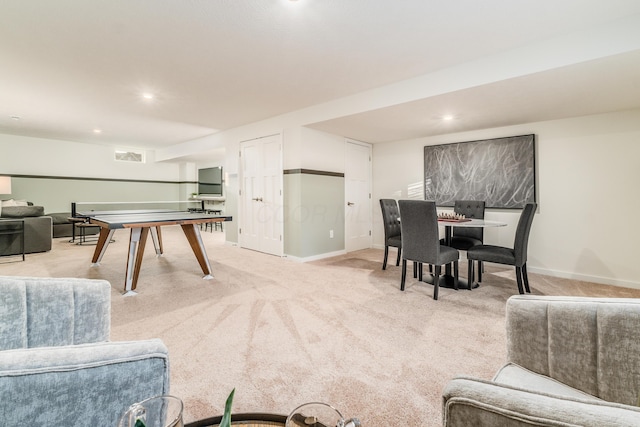 rec room featuring baseboards, recessed lighting, and light colored carpet