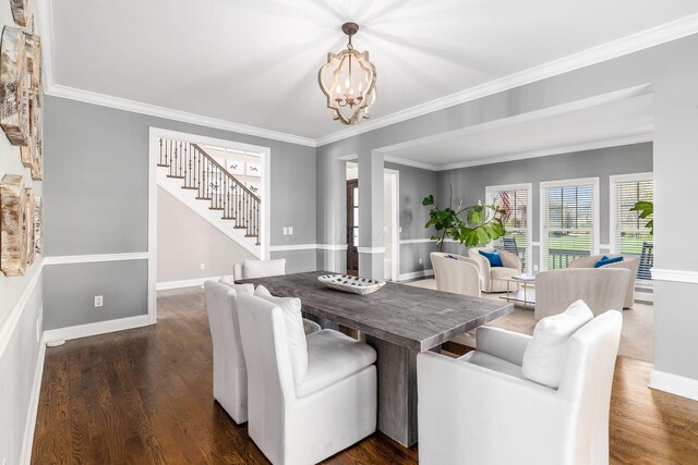 dining space featuring stairway, an inviting chandelier, dark wood-style floors, and baseboards