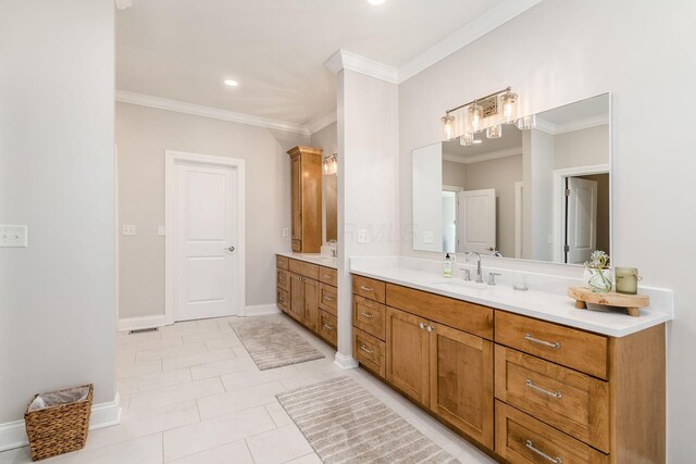 full bathroom with two vanities, a sink, baseboards, recessed lighting, and crown molding