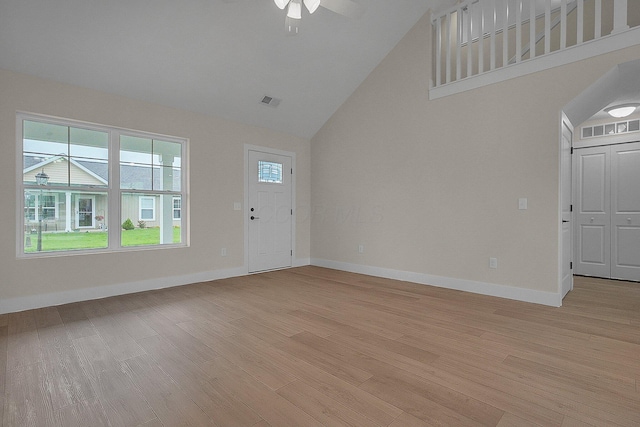 108 Cumberland Meadows Cir, Hebron, OH 43025 - foyer featuring ceiling fan, light wood finished floors, baseboards, and high vaulted ceiling