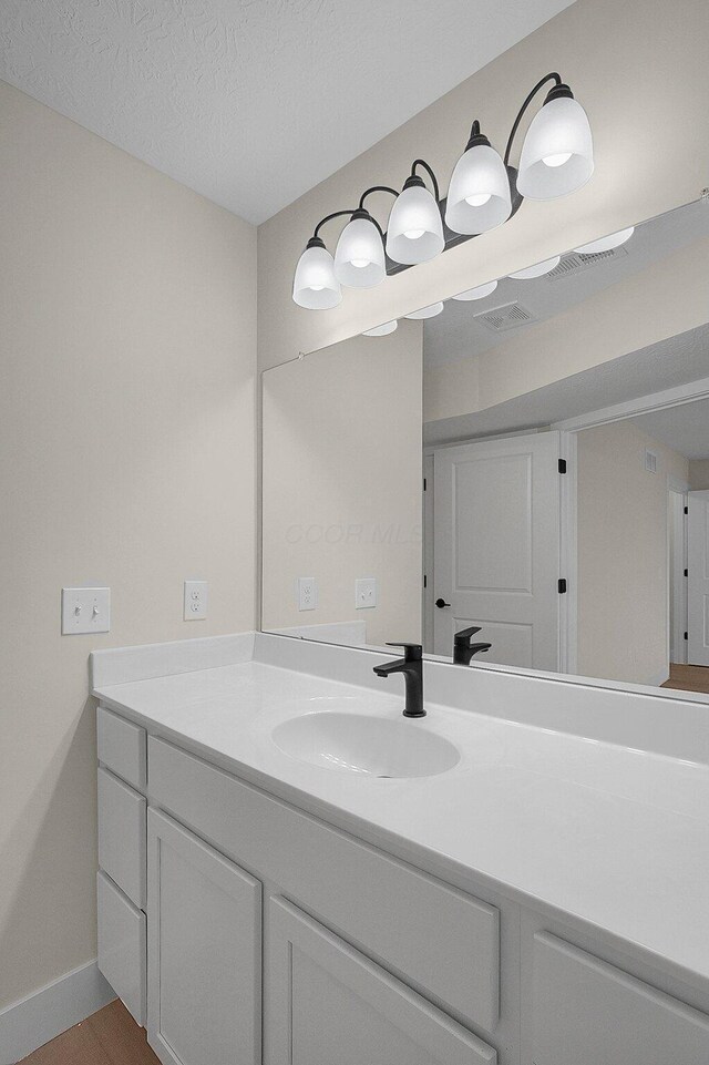 108 Cumberland Meadows Cir, Hebron, OH 43025 - bathroom featuring vanity and baseboards