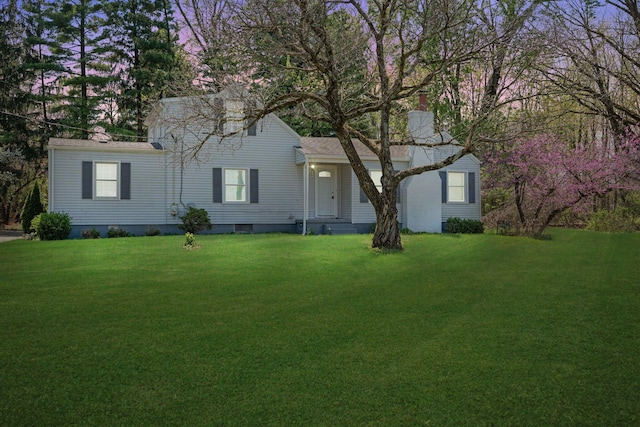 2575 Jordan Rd, Columbus, OH 43231 - view of front facade with a chimney and a front yard