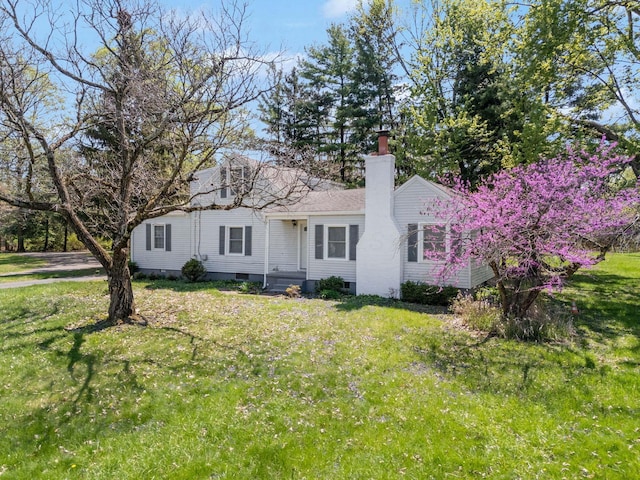 2575 Jordan Rd, Columbus, OH 43231 - single story home with a chimney and a front yard