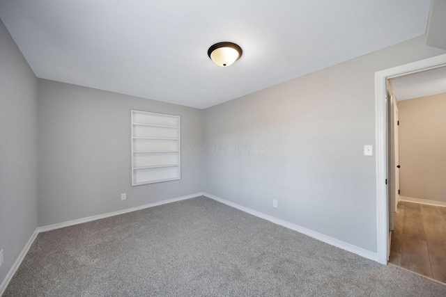 2575 Jordan Rd, Columbus, OH 43231 - unfurnished room with carpet flooring, built in features, and baseboards