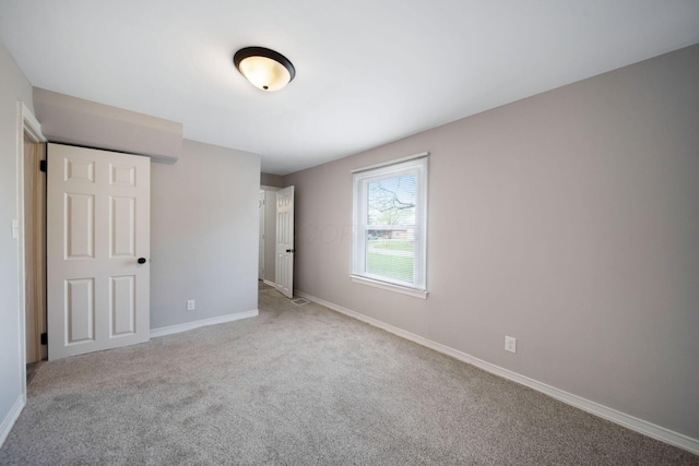 2575 Jordan Rd, Columbus, OH 43231 - unfurnished bedroom with visible vents, baseboards, and carpet flooring