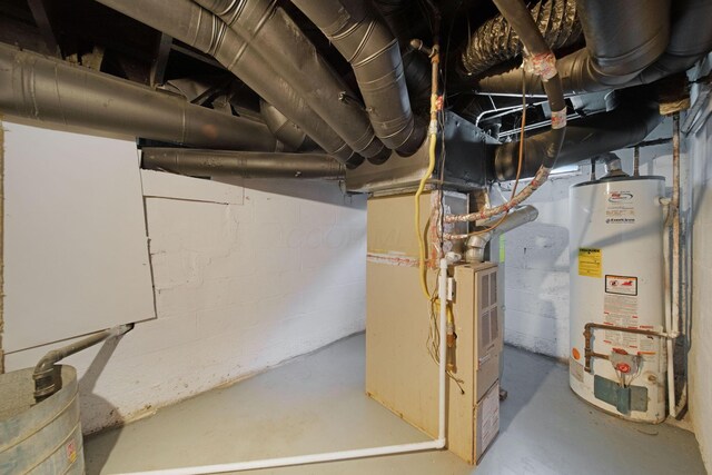 2575 Jordan Rd, Columbus, OH 43231 - unfinished basement featuring heating unit, water heater, and gas water heater