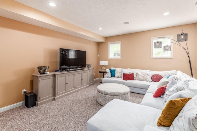 carpeted living room with baseboards and recessed lighting