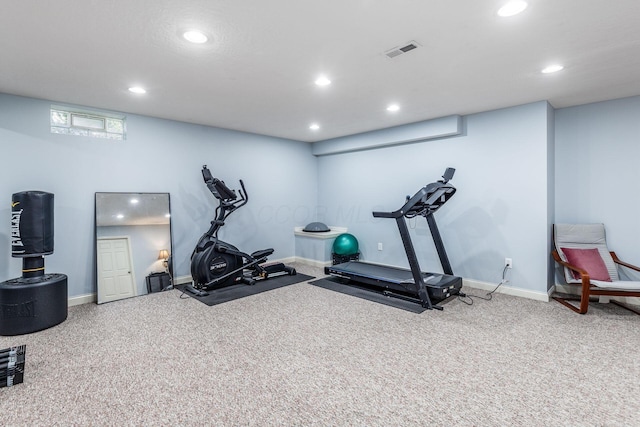 workout room featuring baseboards, carpet flooring, recessed lighting, and visible vents