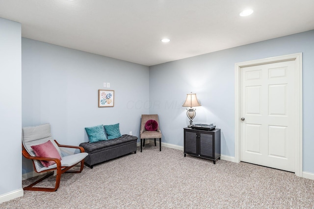 sitting room with baseboards, carpet flooring, and recessed lighting