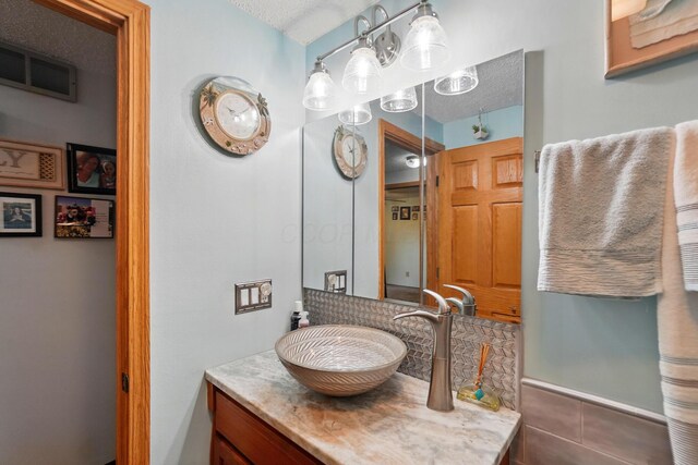 2680 Mellowbrook St, Columbus, OH 43232 - bathroom with vanity, tile patterned floors, and a textured ceiling