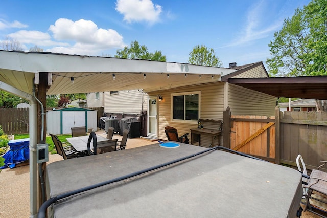 2680 Mellowbrook St, Columbus, OH 43232 - view of patio / terrace with a shed, an outbuilding, fence, and outdoor dining space