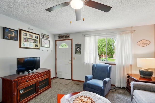 2680 Mellowbrook St, Columbus, OH 43232 - living room with carpet floors, a textured ceiling, and ceiling fan