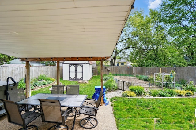 2680 Mellowbrook St, Columbus, OH 43232 - view of patio with a garden, a storage shed, outdoor dining space, and an outdoor structure