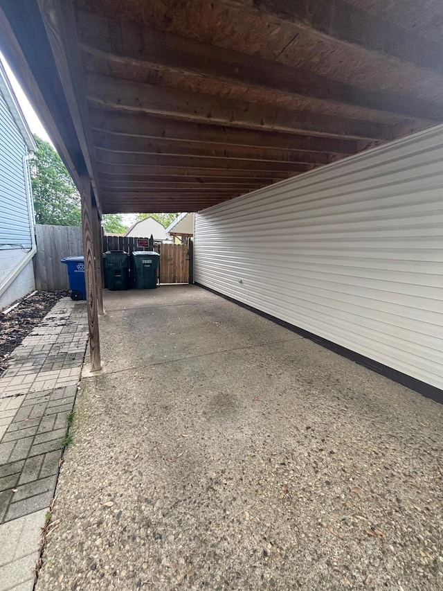 2680 Mellowbrook St, Columbus, OH 43232 - view of patio with fence and an attached carport