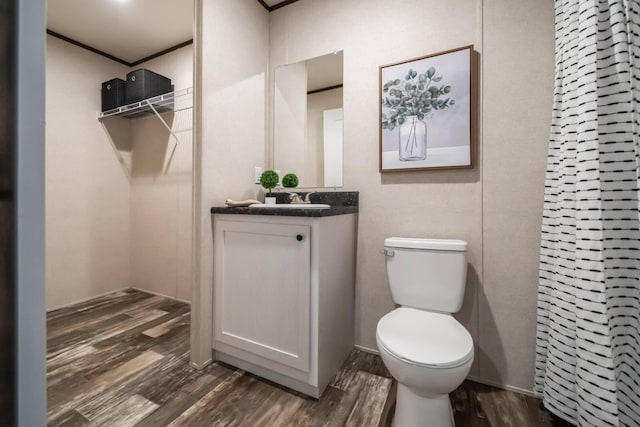 1330 Hanover Rd Unit 205, Delaware, OH 43015 - full bathroom with wood finished floors, toilet, and vanity