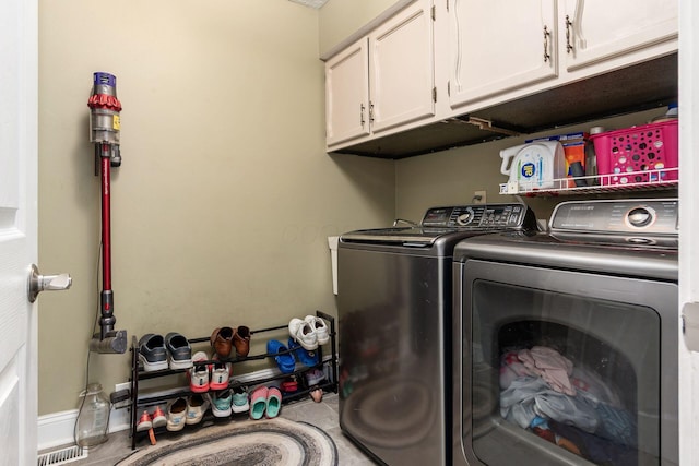 1123 Firth Ave, Worthington, OH 43085 - clothes washing area with independent washer and dryer, cabinet space, and baseboards