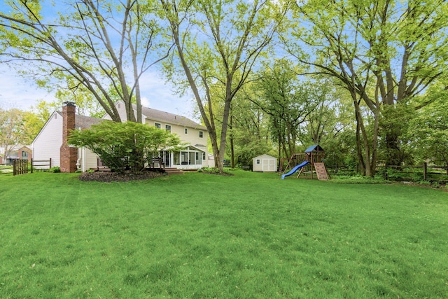 1123 Firth Ave, Worthington, OH 43085 - view of yard with a storage shed, a playground, and an outbuilding