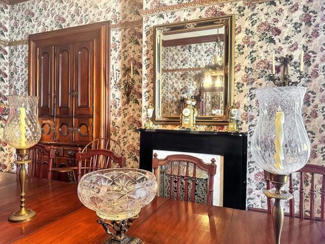 59 S Chillicothe St, South Charleston, OH 45368 - sitting room with wood finished floors and wallpapered walls