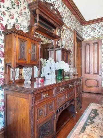 59 S Chillicothe St, South Charleston, OH 45368 - room details with ornamental molding, wood finished floors, and wallpapered walls