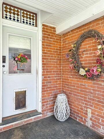59 S Chillicothe St, South Charleston, OH 45368 - doorway to property with brick siding