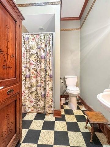 59 S Chillicothe St, South Charleston, OH 45368 - full bath with crown molding, tile patterned floors, a shower with curtain, and toilet