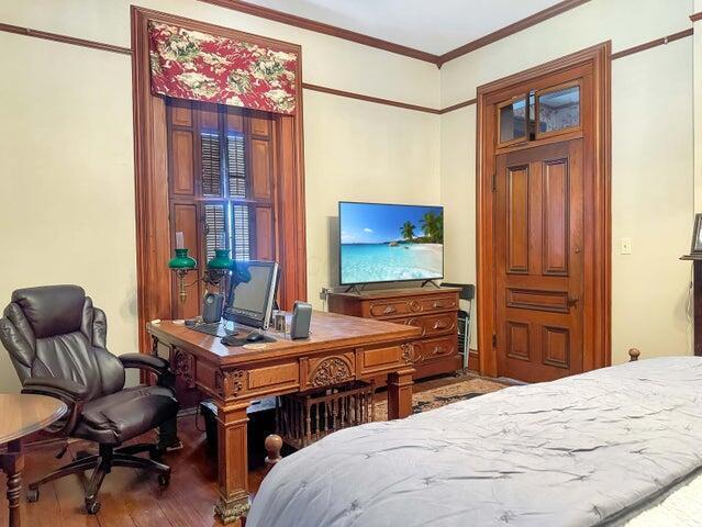59 S Chillicothe St, South Charleston, OH 45368 - bedroom featuring wood finished floors and crown molding