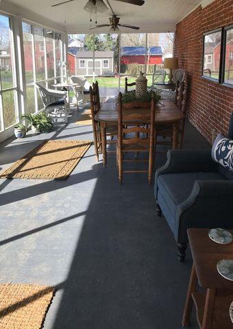 59 S Chillicothe St, South Charleston, OH 45368 - sunroom featuring plenty of natural light, outdoor dining space, and a ceiling fan