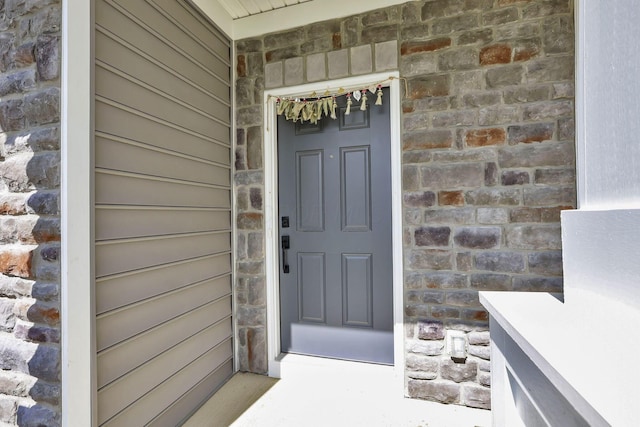 121 E Wind Rd, Delaware, OH 43015 - entrance to property featuring stone siding