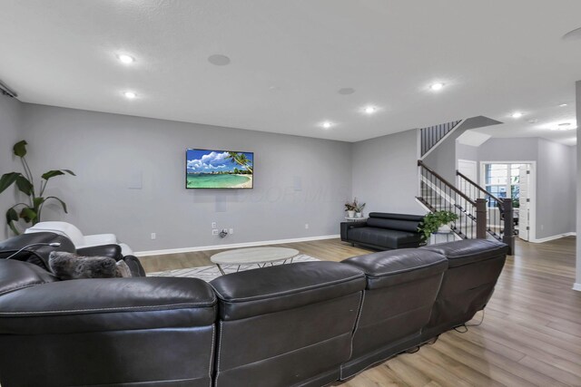 121 E Wind Rd, Delaware, OH 43015 - living area with stairway, recessed lighting, baseboards, and wood finished floors
