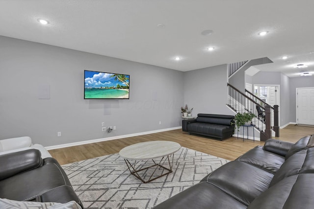 121 E Wind Rd, Delaware, OH 43015 - living room with stairway, wood finished floors, and recessed lighting