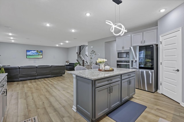 121 E Wind Rd, Delaware, OH 43015 - kitchen featuring recessed lighting, light wood finished floors, appliances with stainless steel finishes, and gray cabinets