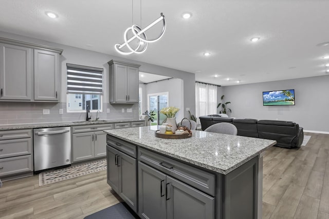 121 E Wind Rd, Delaware, OH 43015 - kitchen with a sink, gray cabinetry, a wealth of natural light, and dishwasher