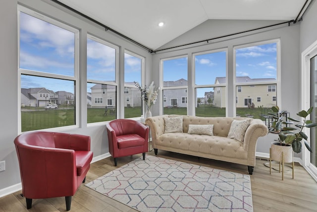 121 E Wind Rd, Delaware, OH 43015 - sunroom featuring wood finished floors, a residential view, baseboards, vaulted ceiling, and recessed lighting