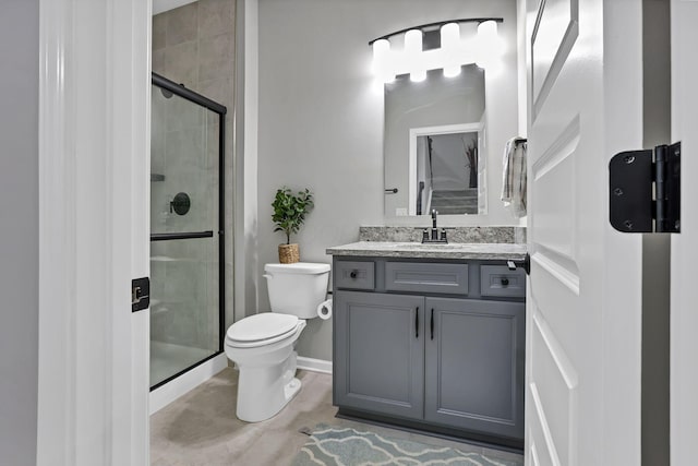 121 E Wind Rd, Delaware, OH 43015 - bathroom with vanity, toilet, and a stall shower