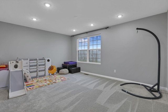 121 E Wind Rd, Delaware, OH 43015 - rec room featuring carpet flooring, baseboards, and recessed lighting