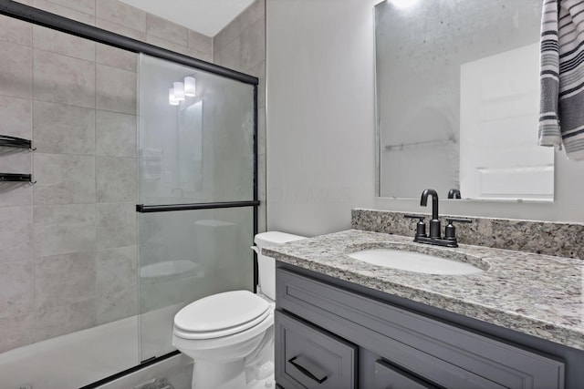 121 E Wind Rd, Delaware, OH 43015 - full bathroom with vanity, toilet, and a shower stall